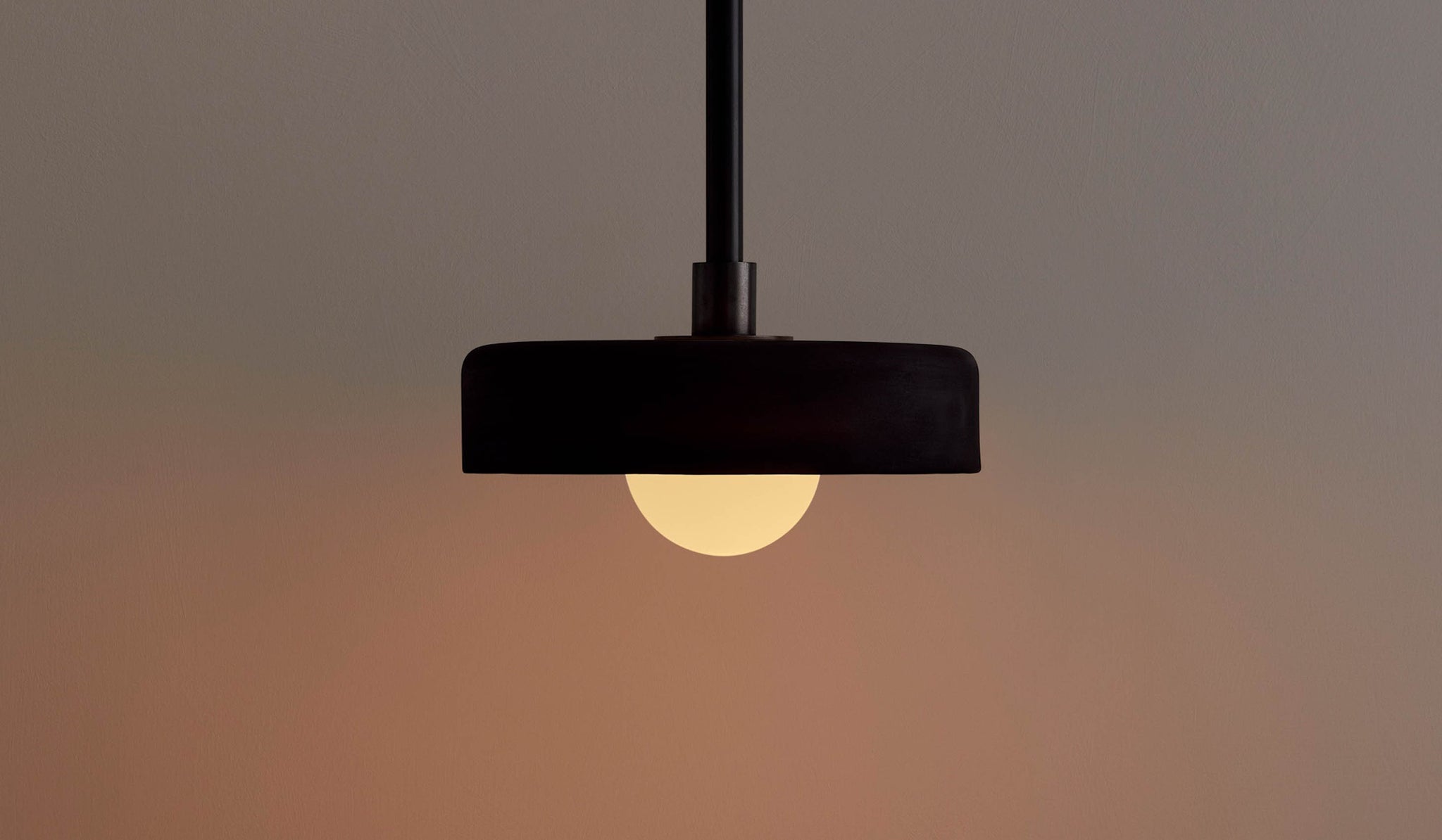 In Common With Black Ceramic Disc Pendant