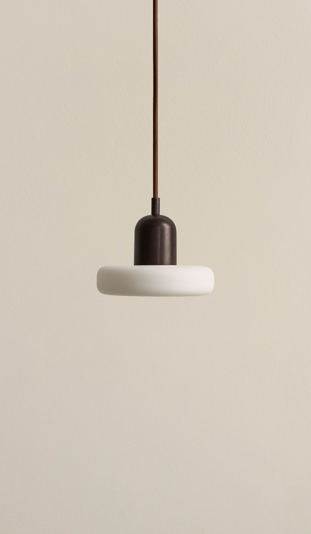 In Common With Puck Pendant
