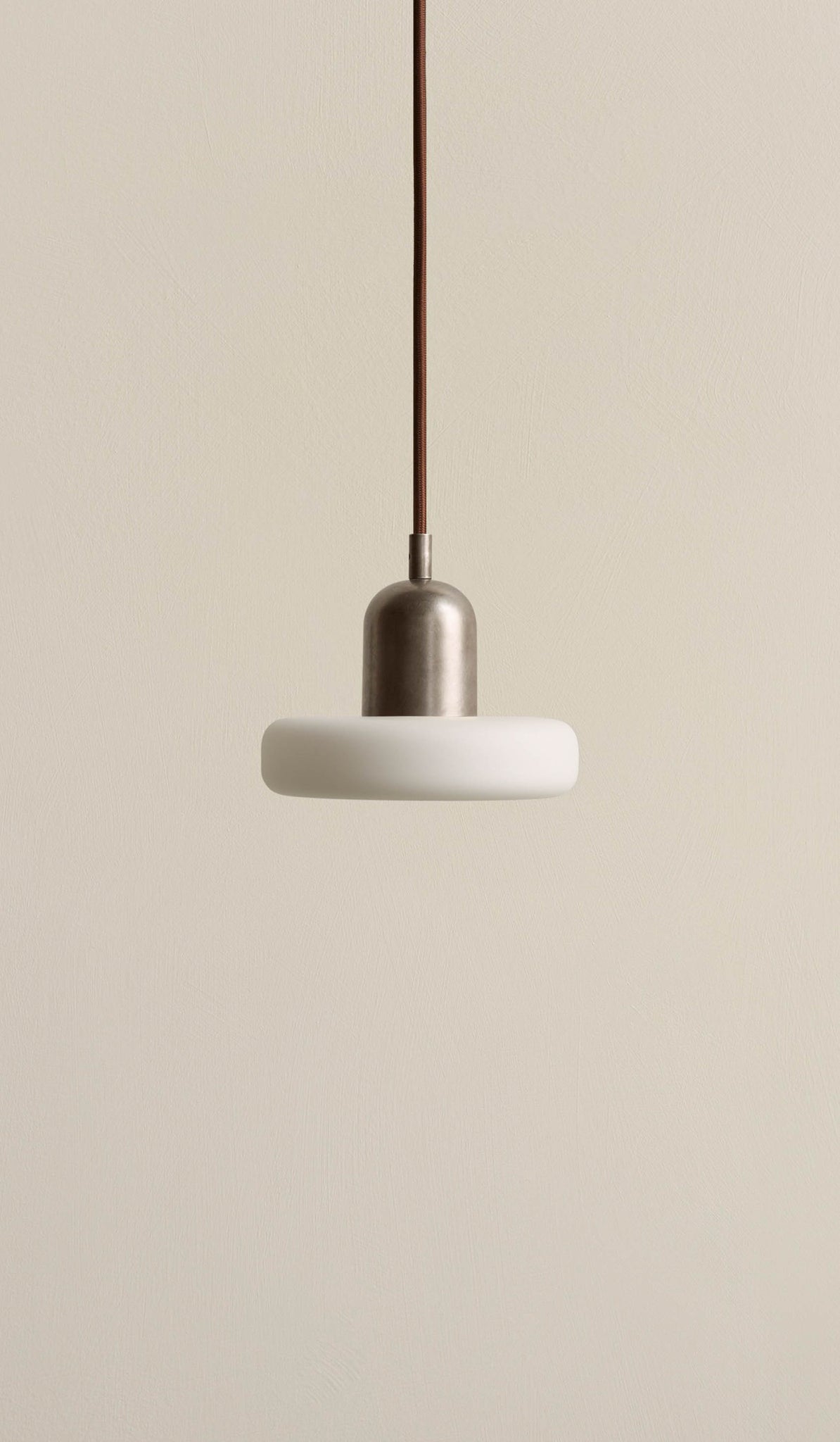In Common With Puck Pendant