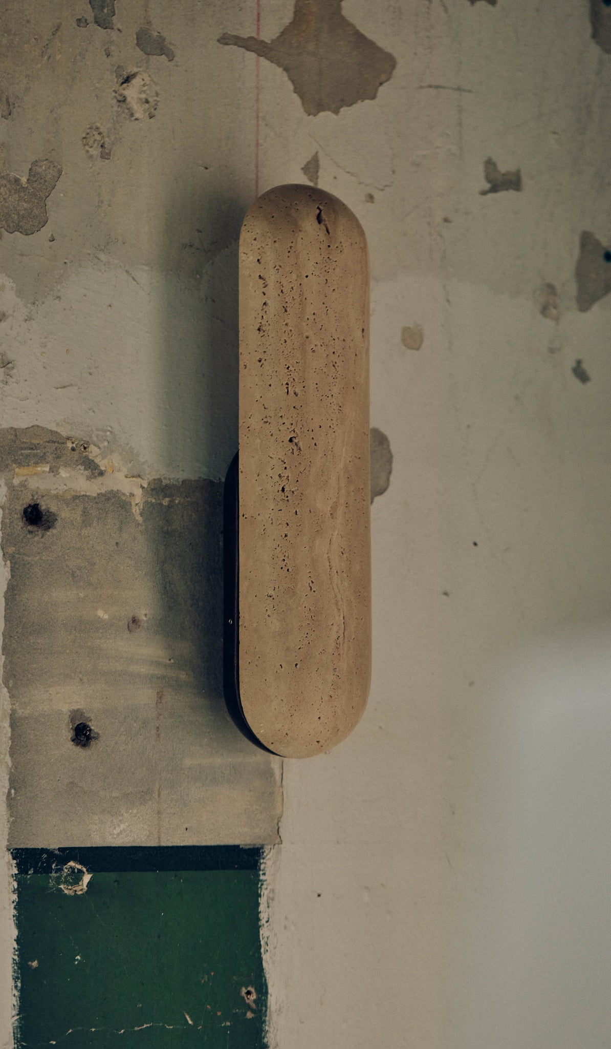 Studio Henry Wilson Classico Travertine with Blackened Cast Bronze Pill Sconce
